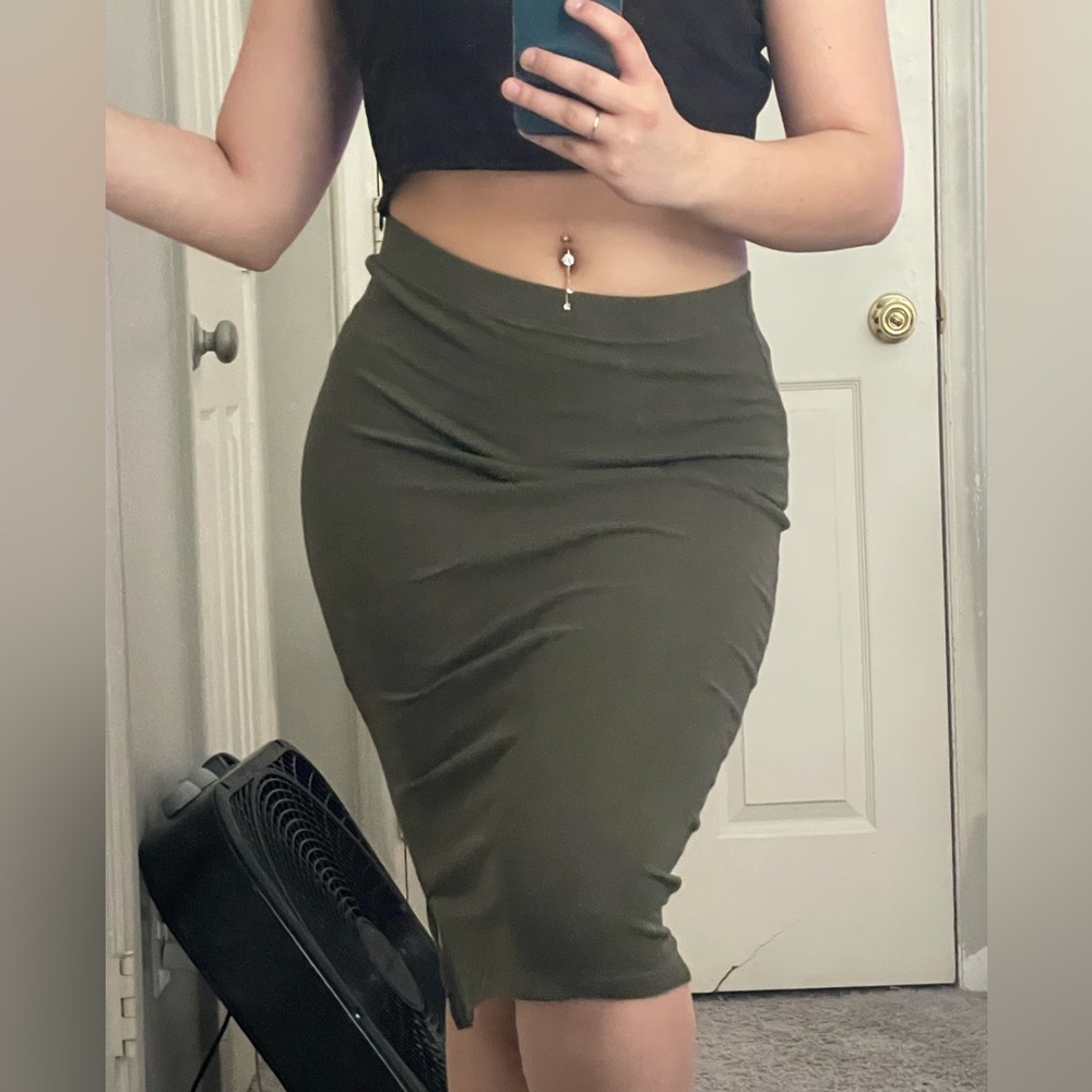 Olive green pencil skirt with a slit on the side